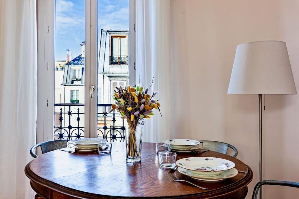 Charmant Appartement Au Coeur De Parijs Buitenkant foto