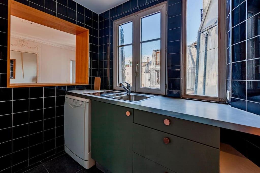 Charmant Appartement Au Coeur De Parijs Buitenkant foto