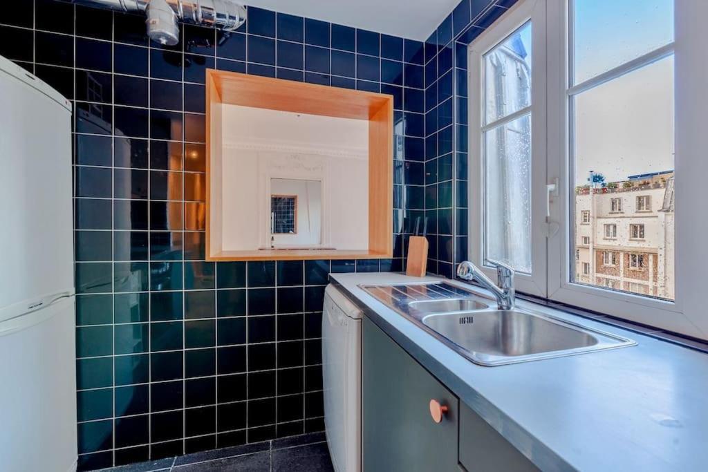 Charmant Appartement Au Coeur De Parijs Buitenkant foto